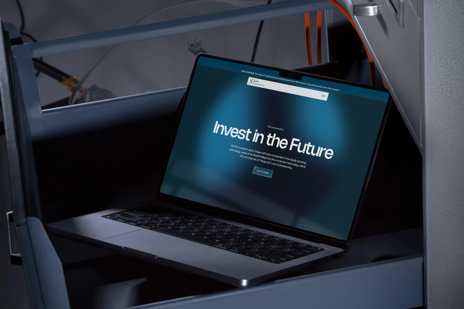 The Sure Ventures PLC homepage on a laptop