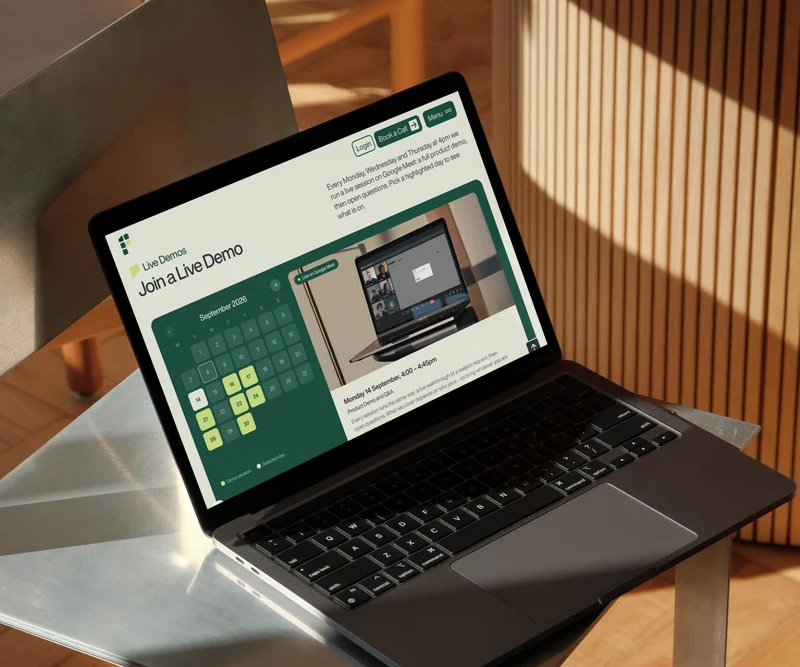 The Fisar live demo booking page on a laptop
