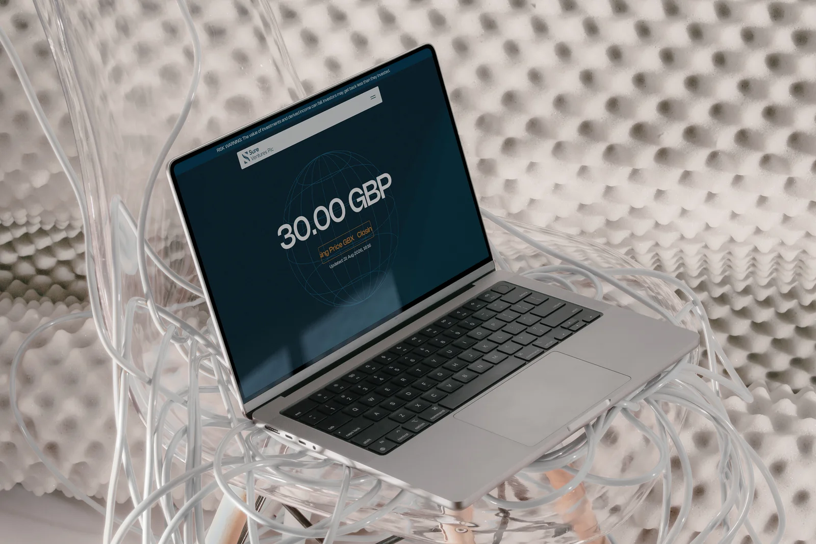 The Sure Ventures PLC share price page on a laptop